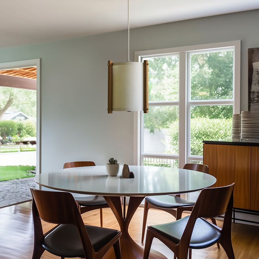 MID CENTURY HOUSE DINNING ROOM WITH WOOD FURNITURE AND WHITE PENDANT