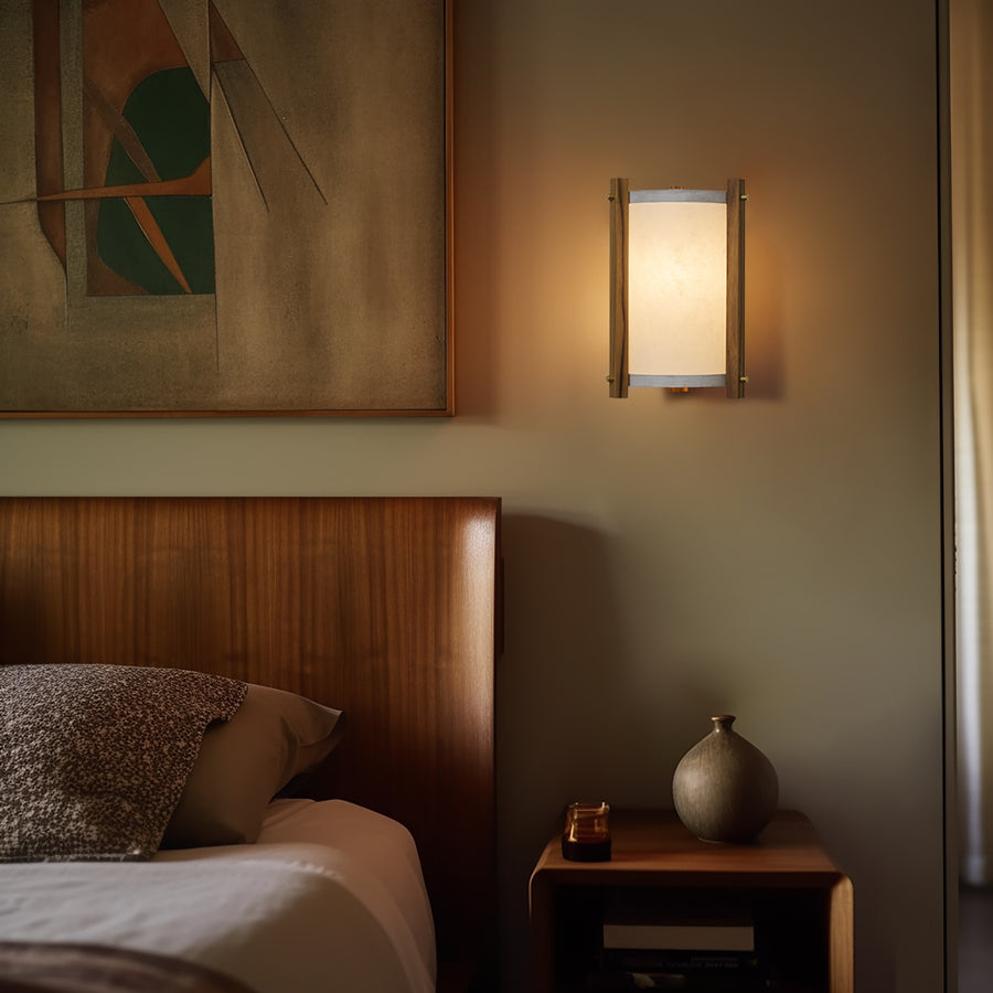 Teak Sconce White Lampshade illuminated on wall with art, bed and nightstand