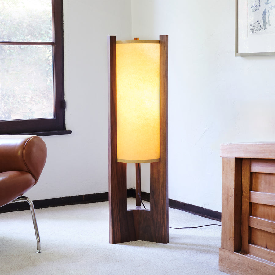 Walnut Floor illuminated Lamp in corner with chair window and dresser