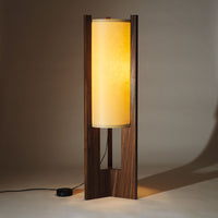 Japanese Mid Century Walnut Floor Lamp illuminated with Sand shade