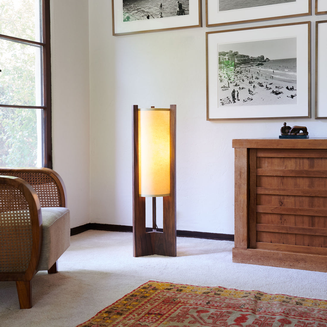 Walnut Floor illuminated Lamp in corner with rug chair window and dresser